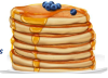 stack of pancakes with syrup and bluberries on top